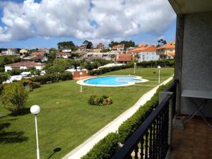 Bazén v ubytování Apartamento fontiñas Sanxenxo montalvo nebo v jeho okolí
