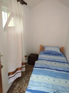 Uma cama ou camas num quarto em Vila Medo