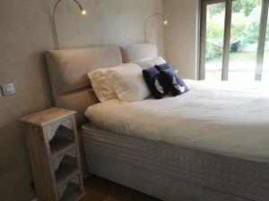 Postel nebo postele na pokoji v ubytování Wellness Sweet Bonihu B&B