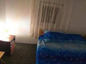 Uma cama ou camas num quarto em Vila Medo