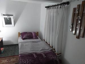 Uma cama ou camas num quarto em Vila Medo
