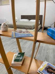 A bed or beds in a room at Casa del Credente