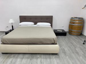 A bed or beds in a room at Casa del Credente