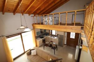 Kuchyň nebo kuchyňský kout v ubytování Theonymfi Luxury Villas