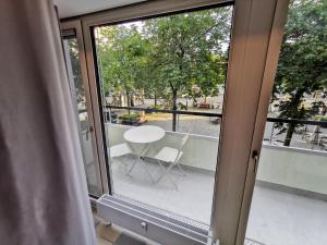 A balcony or terrace at Green Marmot Capsule Hotel Zürich