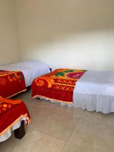 Krevet ili kreveti u jedinici u okviru objekta Hotel Maxim