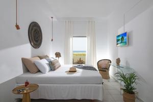 Ένα ή περισσότερα κρεβάτια σε δωμάτιο στο Coastal Key 1