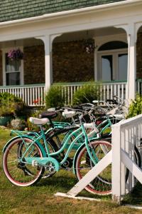 a group of bikes parked in front of a house at The Sullivan House in New Shoreham