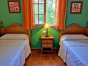 Posteľ alebo postele v izbe v ubytovaní Casa Laguna del Maiz cazorla
