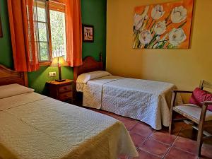 Posteľ alebo postele v izbe v ubytovaní Casa Laguna del Maiz cazorla