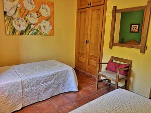 Posteľ alebo postele v izbe v ubytovaní Casa Laguna del Maiz cazorla