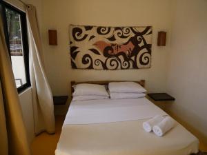 Letto o letti in una camera di Lazy Dog Bed & Breakfast
