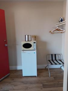 Kuchyň nebo kuchyňský kout v ubytování Seely's Motel