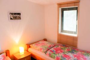 Ένα ή περισσότερα κρεβάτια σε δωμάτιο στο Ferienhaus Klein Finnland - free Wifi +17 φωτογραφίες