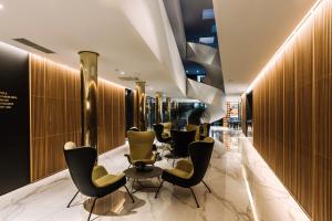 Predel za sedenje v nastanitvi Hotel A plus