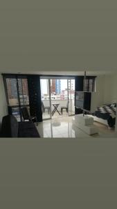 Posezení v ubytování Algo diferente de lo normal, cortinas eléctricas!