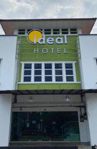 a hotel sign over the entrance to a building at Hotel Ideal Senawang in Seremban