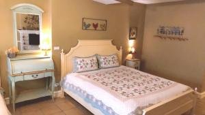 Postel nebo postele na pokoji v ubytování Fazhana Village B&B