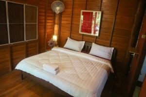 Krevet ili kreveti u jedinici u okviru objekta Maewin Guest House and Resort