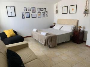 Ένα ή περισσότερα κρεβάτια σε δωμάτιο στο apartmentsIT vista mare