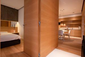 Katil atau katil-katil dalam bilik di Beachfront Apartment Rosa del Mar Jardin