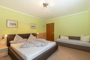 Postel nebo postele na pokoji v ubytování Appartement Rosengarten