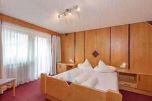 Postel nebo postele na pokoji v ubytování Appartement Rosengarten