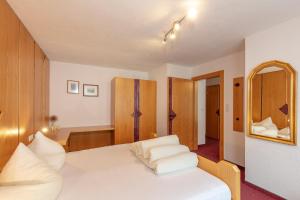 Postel nebo postele na pokoji v ubytování Appartement Rosengarten