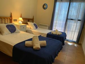 Postel nebo postele na pokoji v ubytování Villa Gómez + 37 fotografií