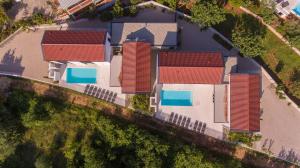 an overhead view of a house with red roof at Casa Bela in Klimno