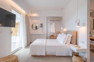 Postel nebo postele na pokoji v ubytování Ninemia Luxury Residence