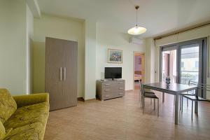TV a/nebo společenská místnost v ubytování Residence Palazzo Gasparroni