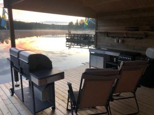 Balkón nebo terasa v ubytování Rustika strandstugor utanför Rättvik