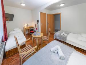 Postel nebo postele na pokoji v ubytování Murena Hotel i Restauracja