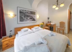 Postel nebo postele na pokoji v ubytování Murena Hotel i Restauracja