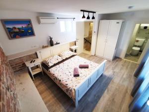 Posteľ alebo postele v izbe v ubytovaní CroBeauty Villa