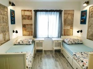 Posteľ alebo postele v izbe v ubytovaní CroBeauty Villa