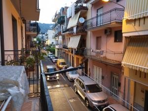 a view of a city street with cars parked at Chiara Naxos Apartment in Giardini Naxos