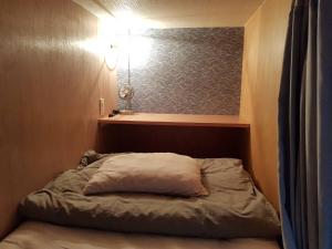 Postel nebo postele na pokoji v ubytování Sen Guesthouse