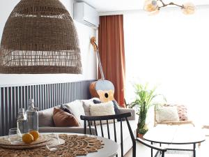 a living room with a couch and a table at Central Point by Zoom Apartments in Bratislava