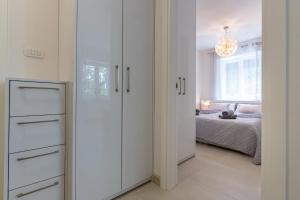 Posteľ alebo postele v izbe v ubytovaní Apartmani Kecman