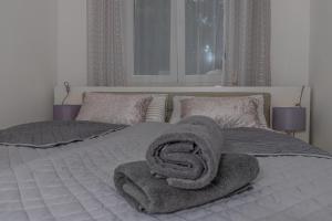Posteľ alebo postele v izbe v ubytovaní Apartmani Kecman