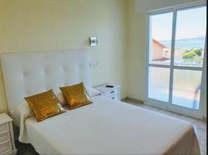 Posteľ alebo postele v izbe v ubytovaní Hotel costa mar