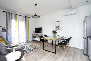 TV a/nebo společenská místnost v ubytování Apartmani Marta