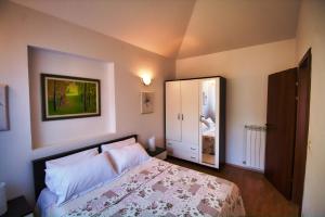 Postel nebo postele na pokoji v ubytování MONTE Beach Apartments