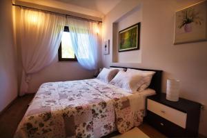 Postel nebo postele na pokoji v ubytování MONTE Beach Apartments