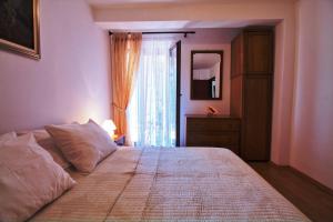 Postel nebo postele na pokoji v ubytování MONTE Beach Apartments