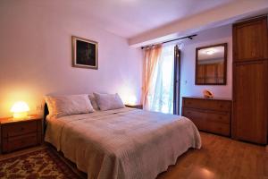 Postel nebo postele na pokoji v ubytování MONTE Beach Apartments