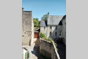 an aerial view of a castle with turrets at La maison perchée in Bayeux
