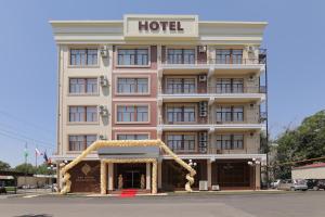 a hotel on the corner of a street at ARK BILLUR HALAL Hotel in Tashkent